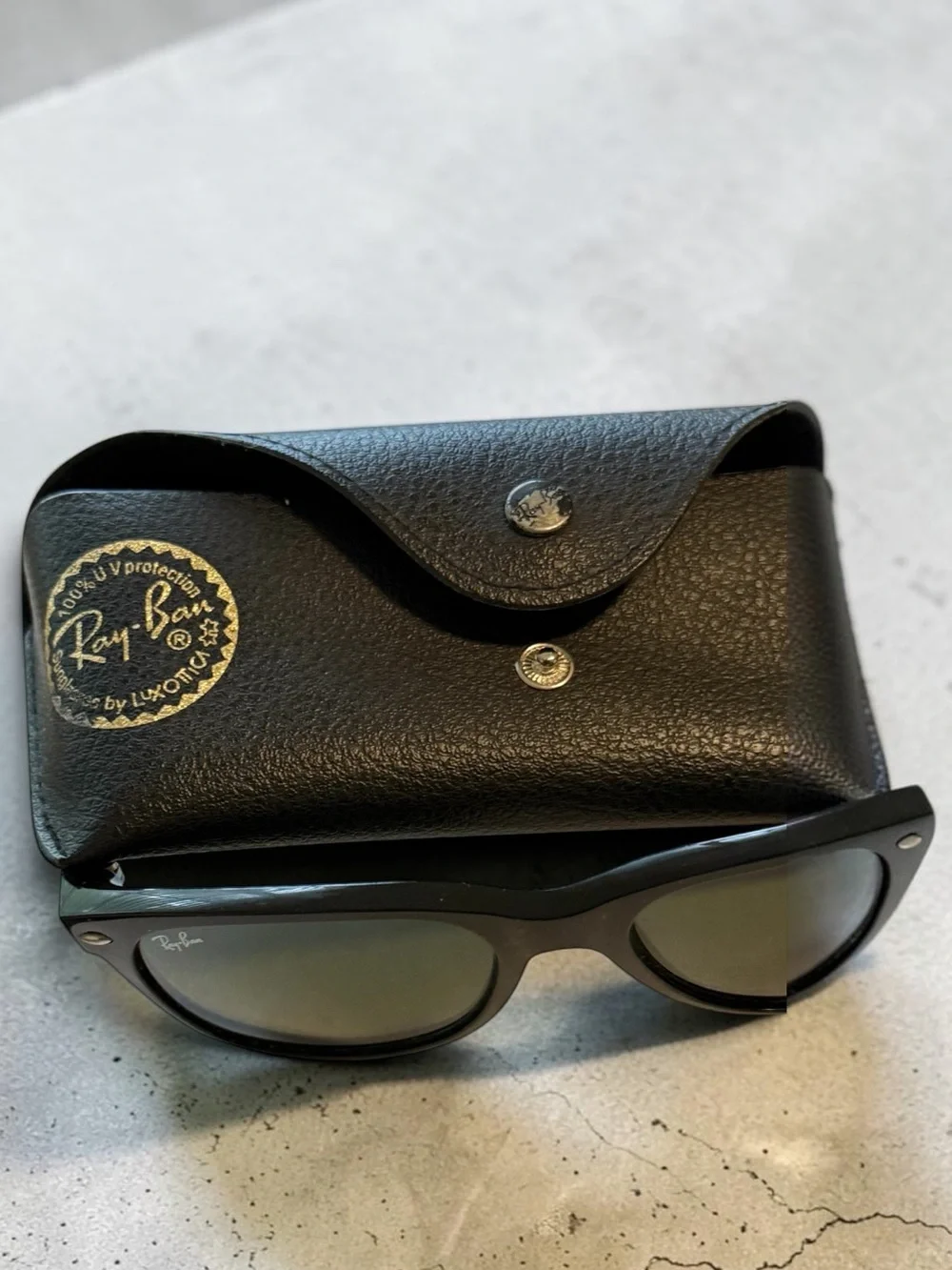 Ray-Ban Black Frame Sunglasses with Dark Lenses